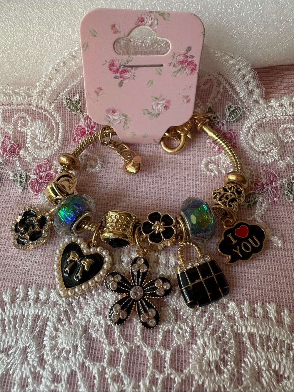 Gold-Tone Black Charm Bracelet with Black Enamel & Crystal Flower Accents